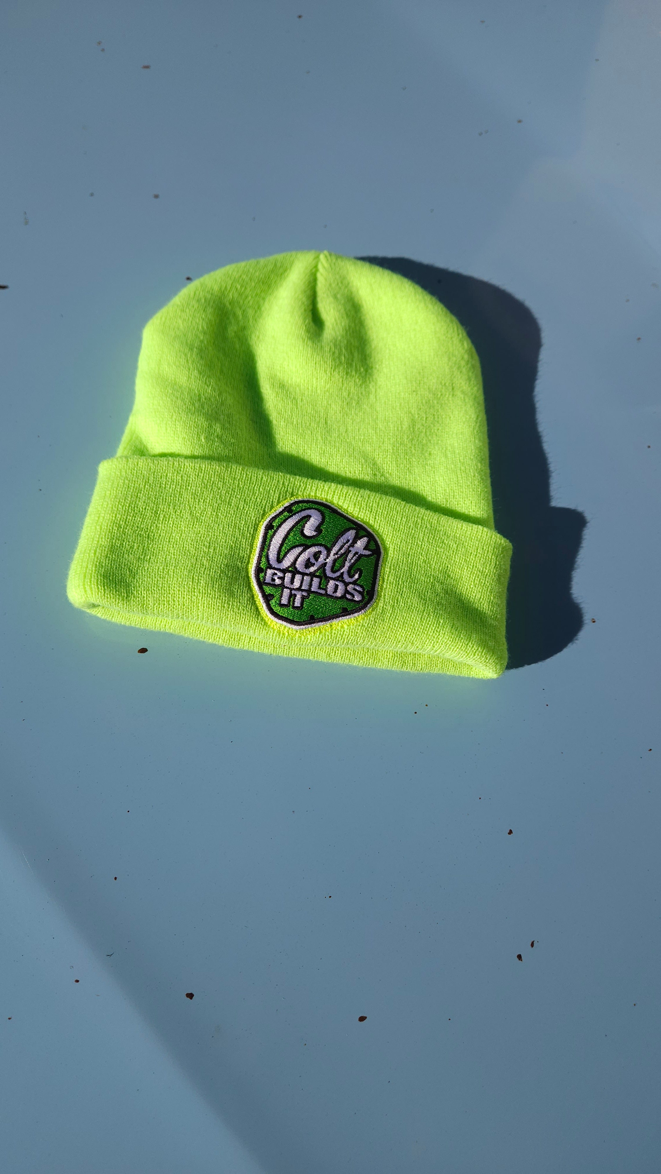Colt Builds It green cuffed beanie with embroidered logo on fold-over hem